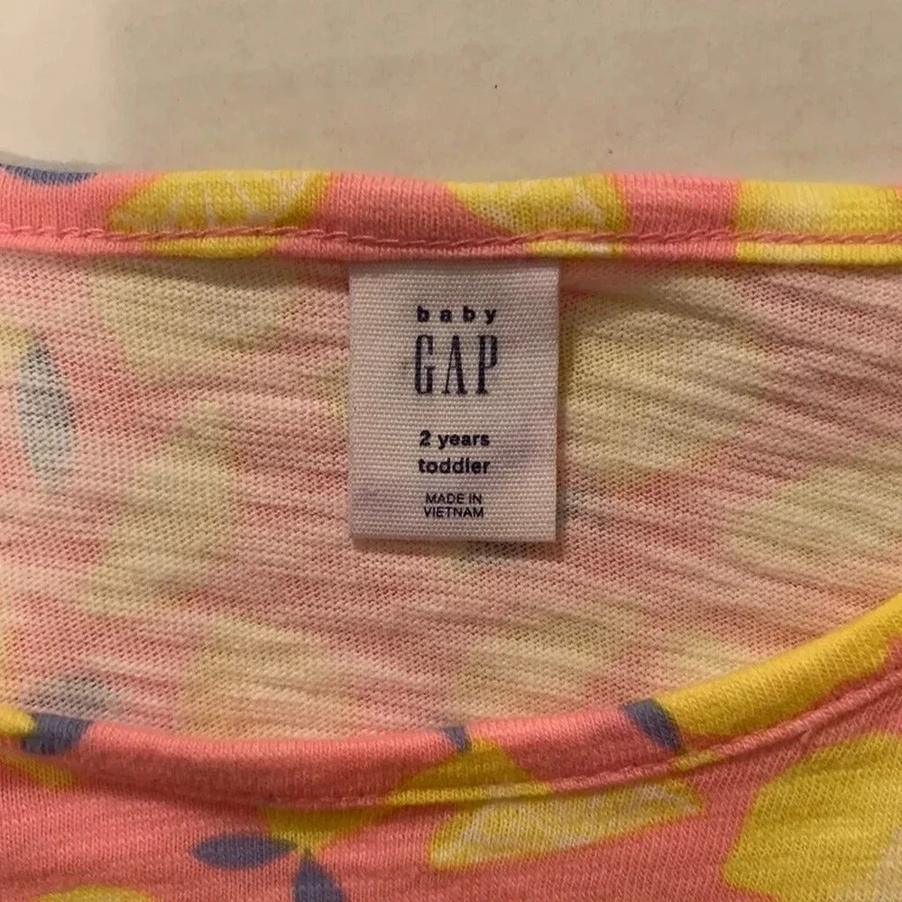 Baby Gap Lemon Romper. New without tags. Size 2